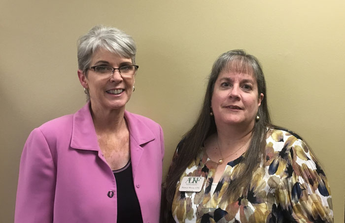 Two women posing for a photo.