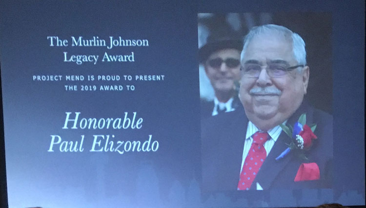 Award presentation for Paul Elizondo