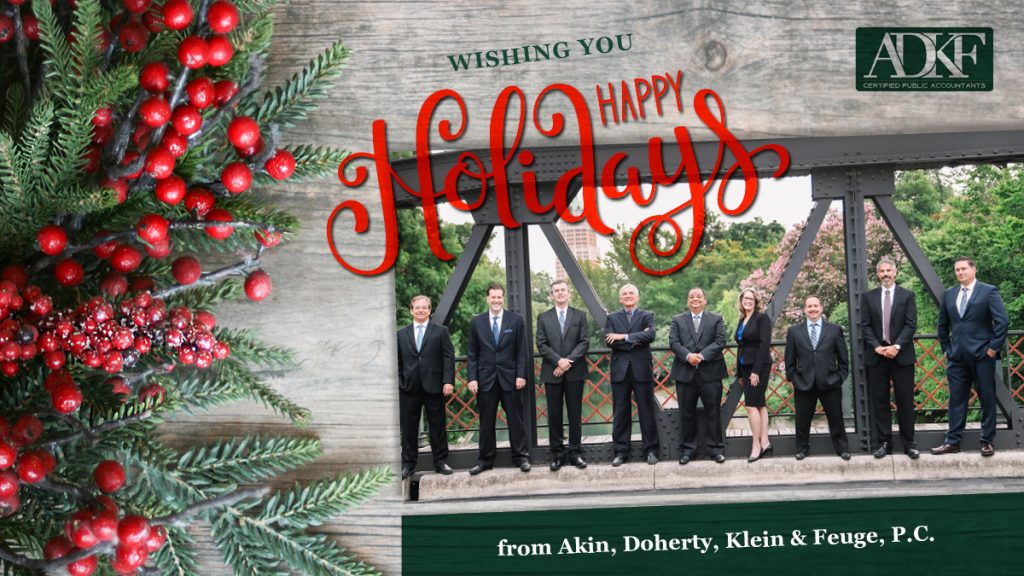 Group holiday greeting with festive decorations.