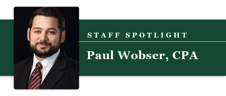 Professional portrait with name and title.