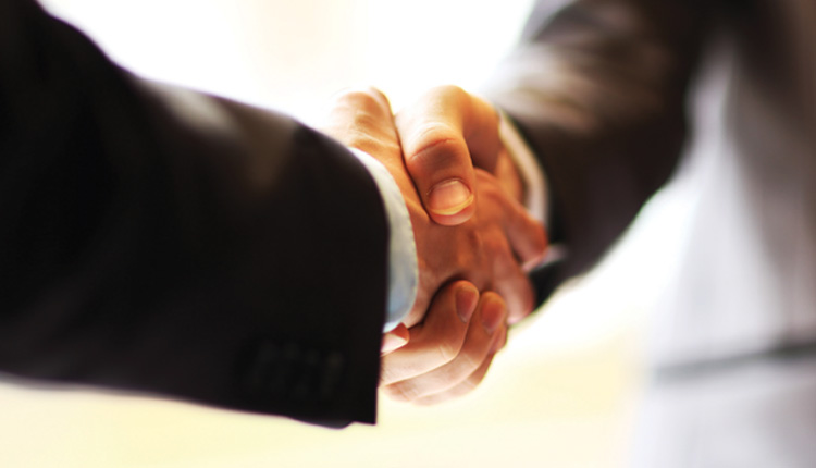 Two hands shaking in agreement