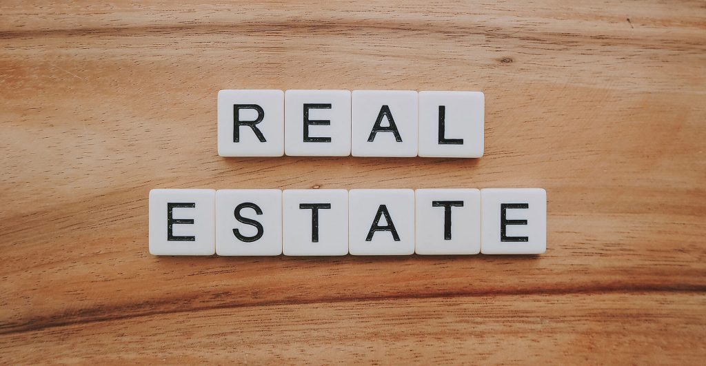 Letters spelling 'REAL ESTATE'