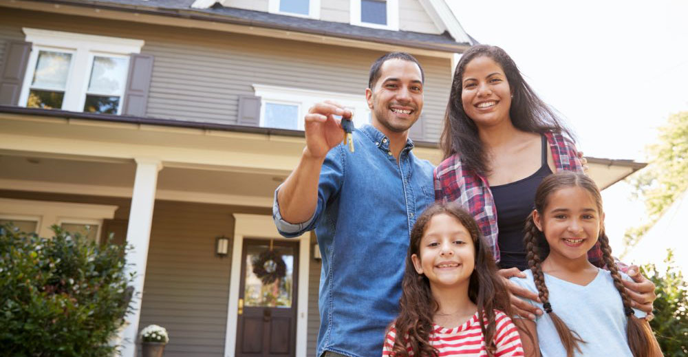 Family celebrating new home ownership.