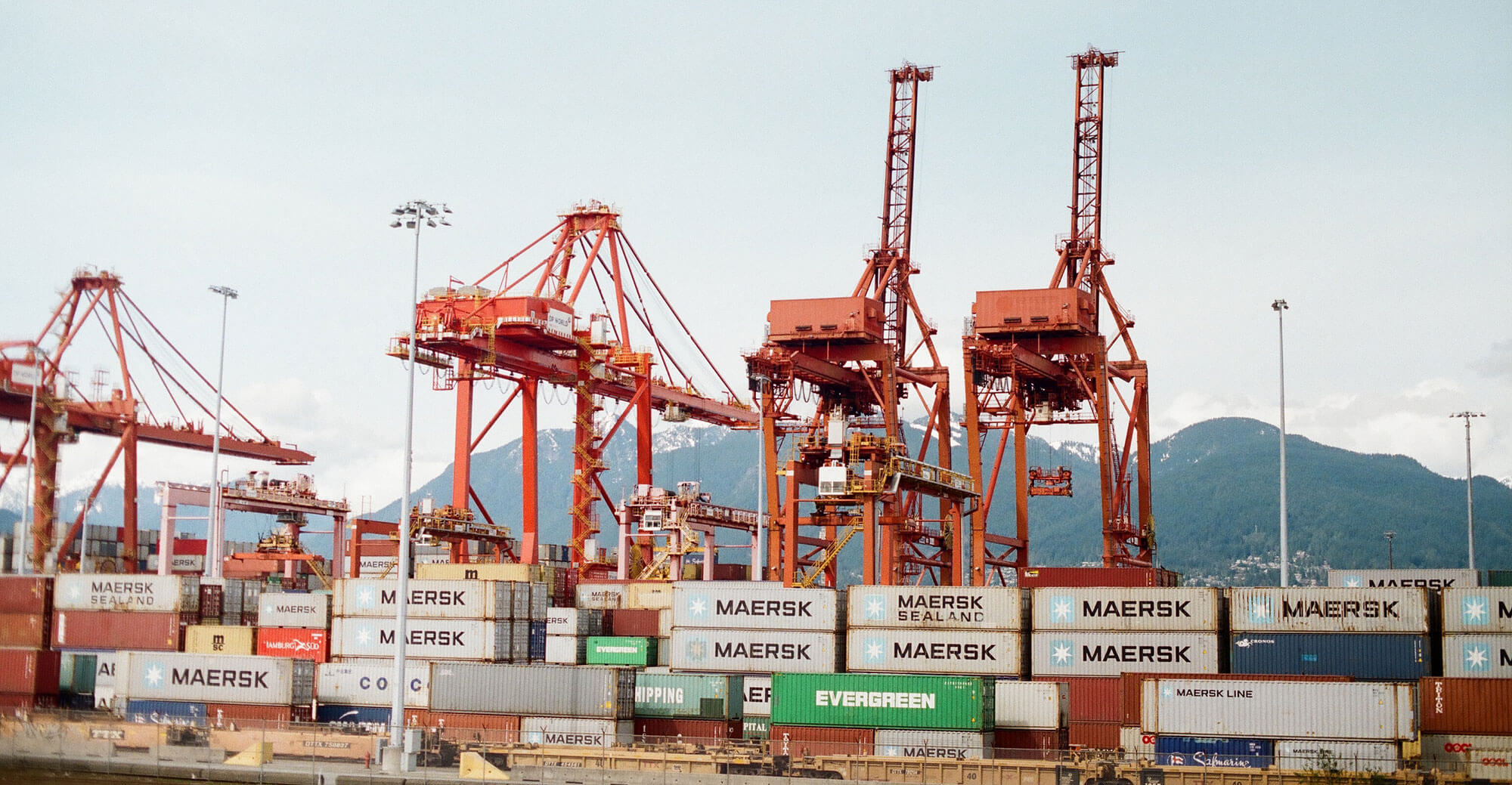 Shipping containers at a busy port.
