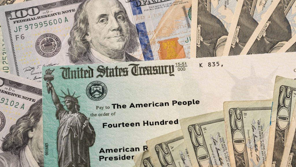 Various U.S. currency and checks.