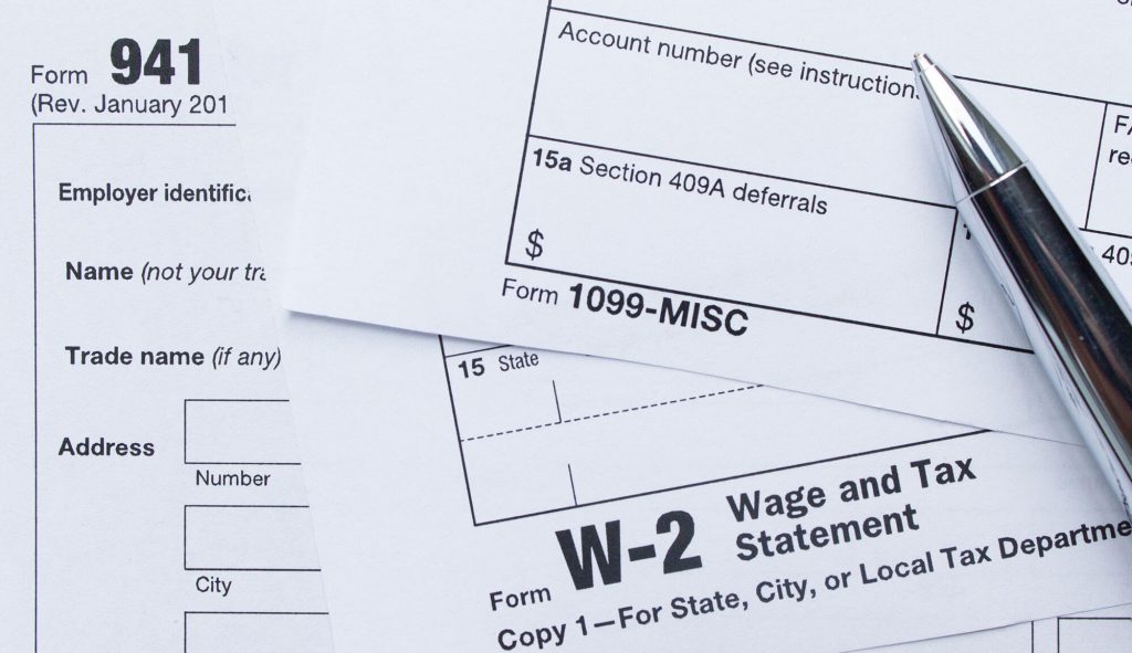Tax forms and documents on table