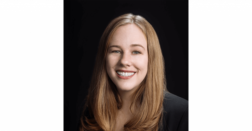 Person with long, wavy hair.