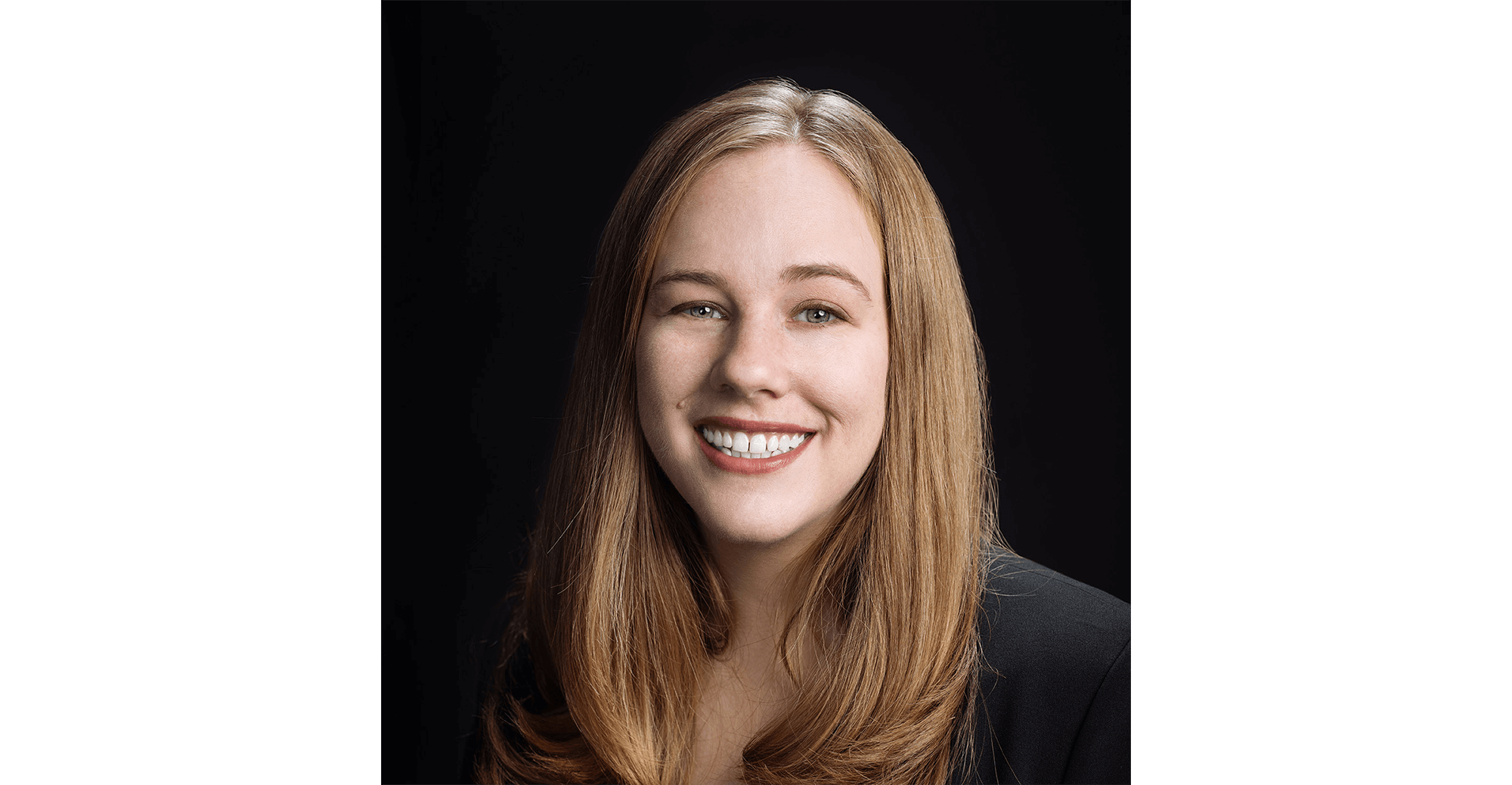 Person with long, wavy hair.