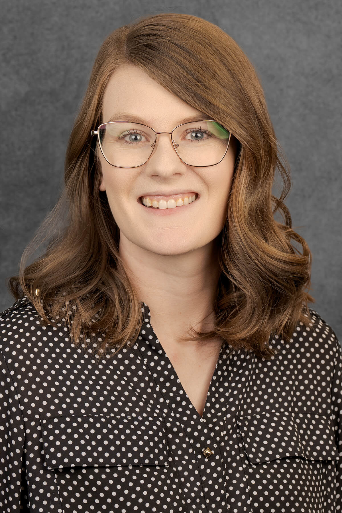 Person with wavy brown hair