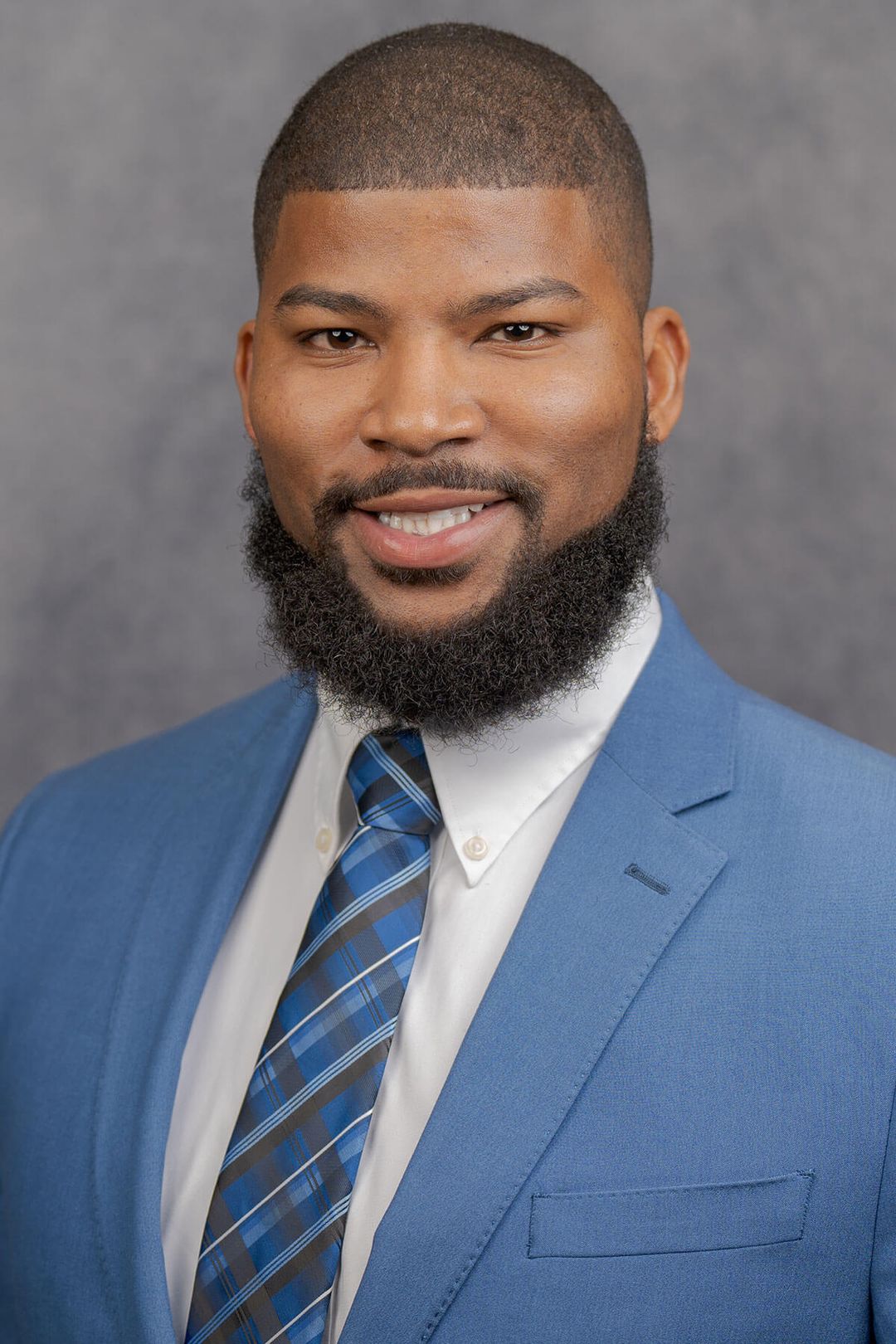 Man in blue suit and tie
